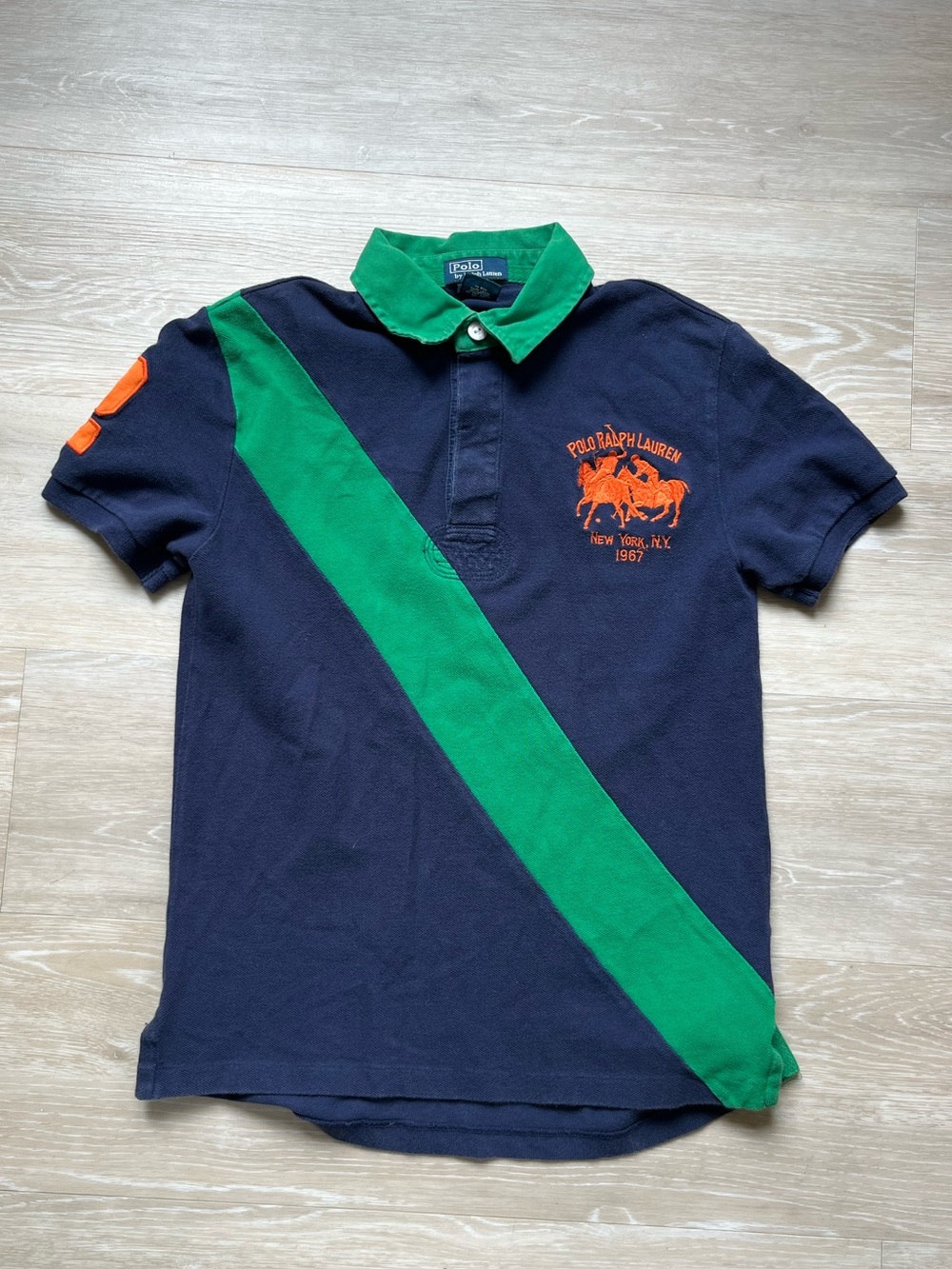 Polo by Ralph Lauren Navy Polo with Green Diagonal Stripe and Orange Accents